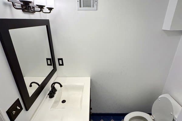 Tile shower scrubbed and detailed